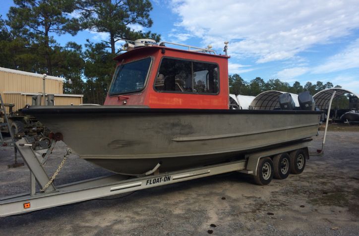 <strong>1984 24 Sea Ark (135)</strong>1984 24 Sea Ark Workboat with tin 1999 Evinrude 150 Outboards